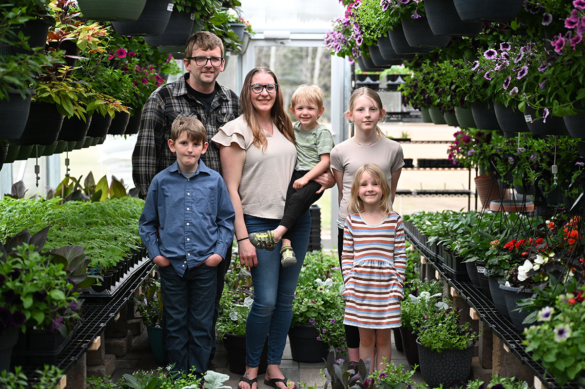 image of the Canopy Gardens Greenhouse family owners