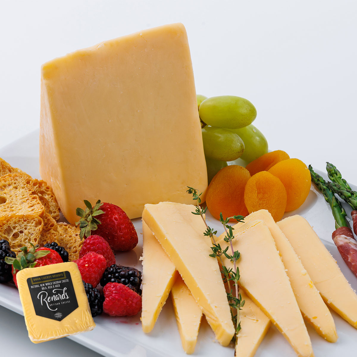 Image of Renard's New World Cheddar Wisconsin Cheese and Charcuterie board.